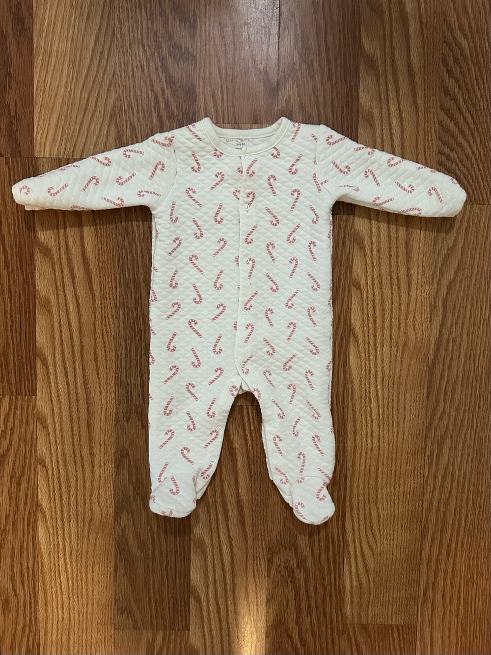Baby Quilted One-Piece Footed Pajamas in White with Candy Cane Print (3-6 months